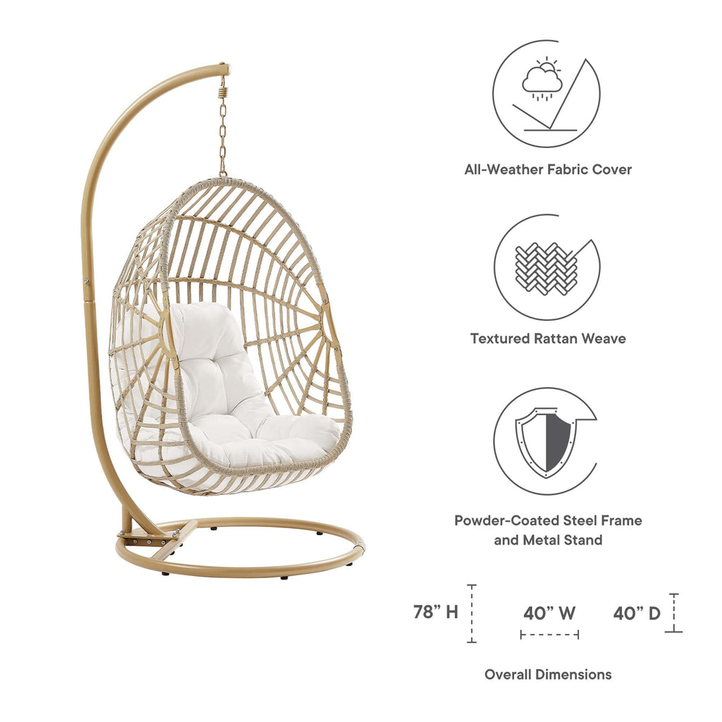 Outdoor hanging wicker swing chair with white cushion and powder-coated metal stand.