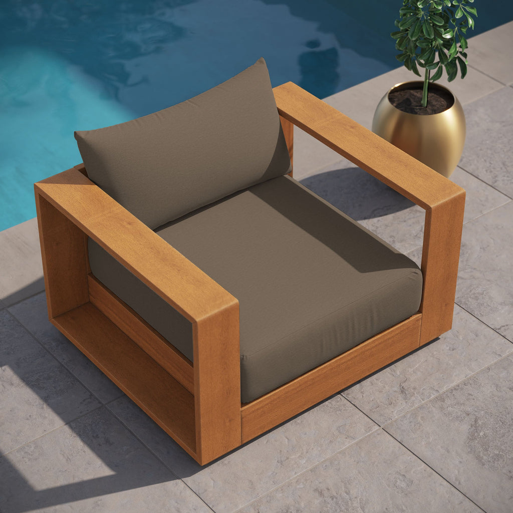 Outdoor patio acacia lounge chair with dark cocoa cushions and arm frame