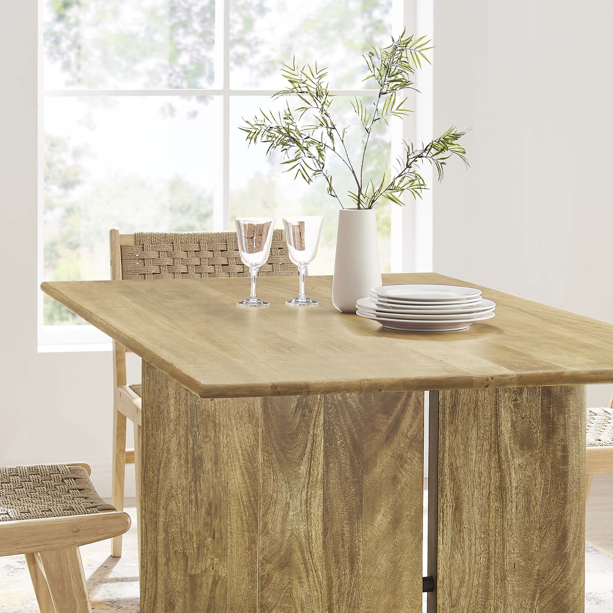 Rectangular wood dining table with oak-toned finish and sturdy legs