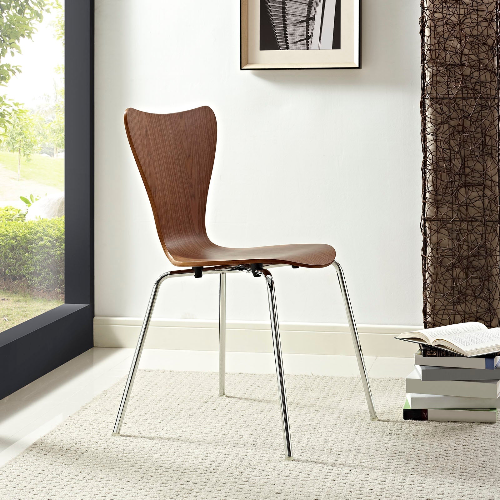 Brown wood dining side chair with curved back and molded seat, chrome metal legs