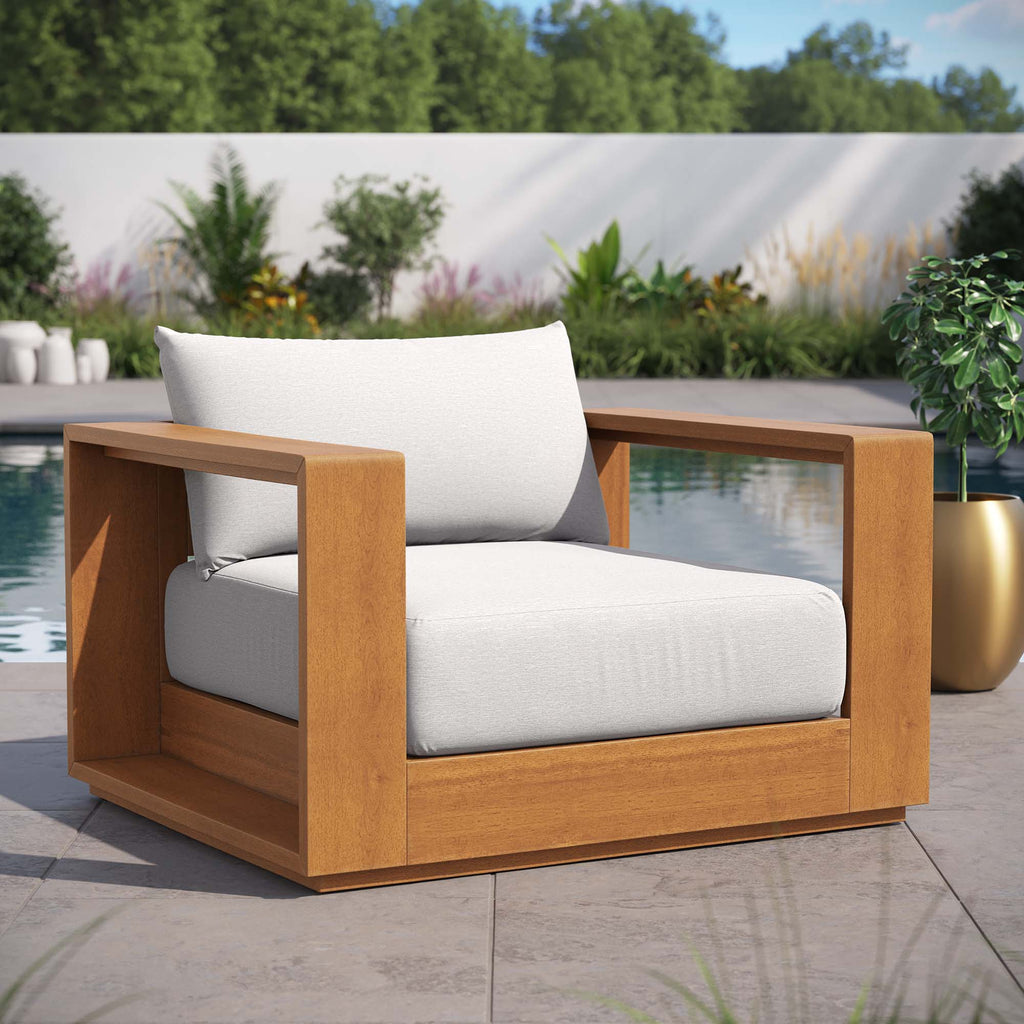 Outdoor patio acacia lounge chair with light gray cushions and arm frame