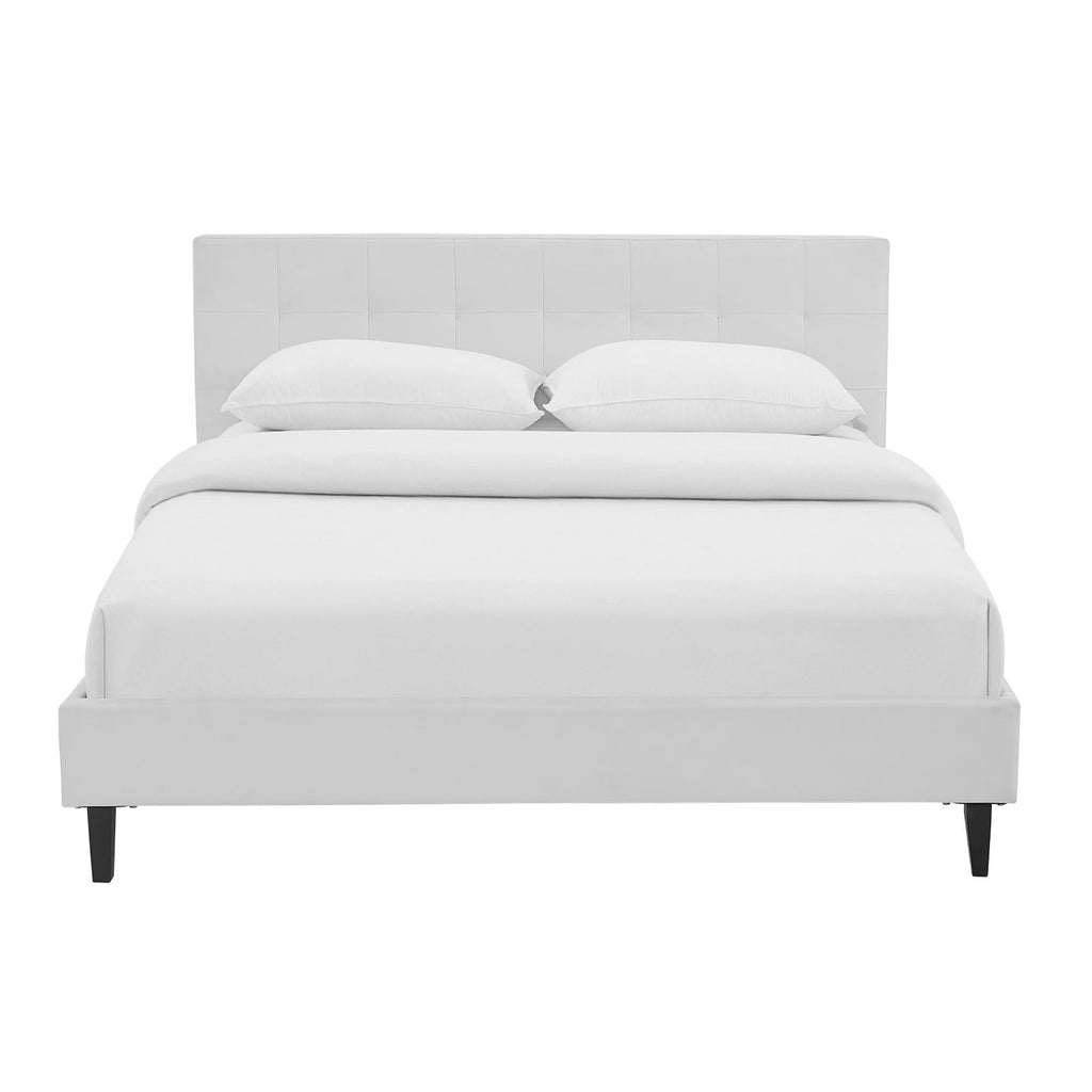 White queen upholstered platform bed frame with tufted headboard and two pillows