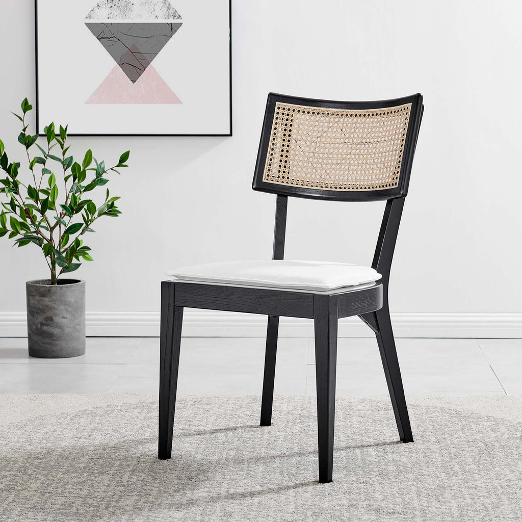 Wood dining chair with black frame, woven rattan cane backrest, beige seat cushion