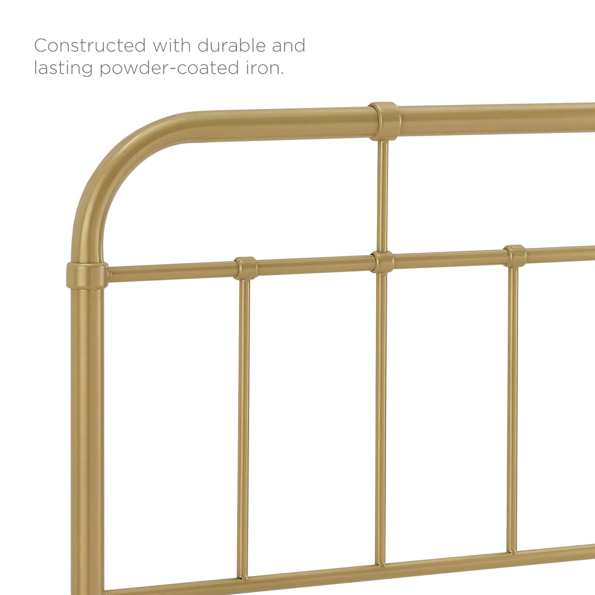 Metal headboard close-up with vertical bars and rounded top rail, gold finish
