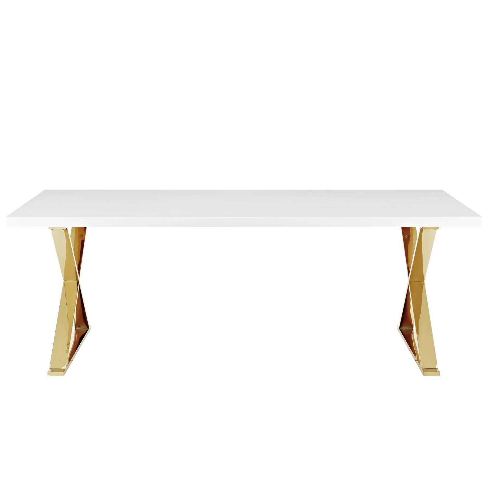 Rectangular dining table with glossy white top and open-frame gold legs
