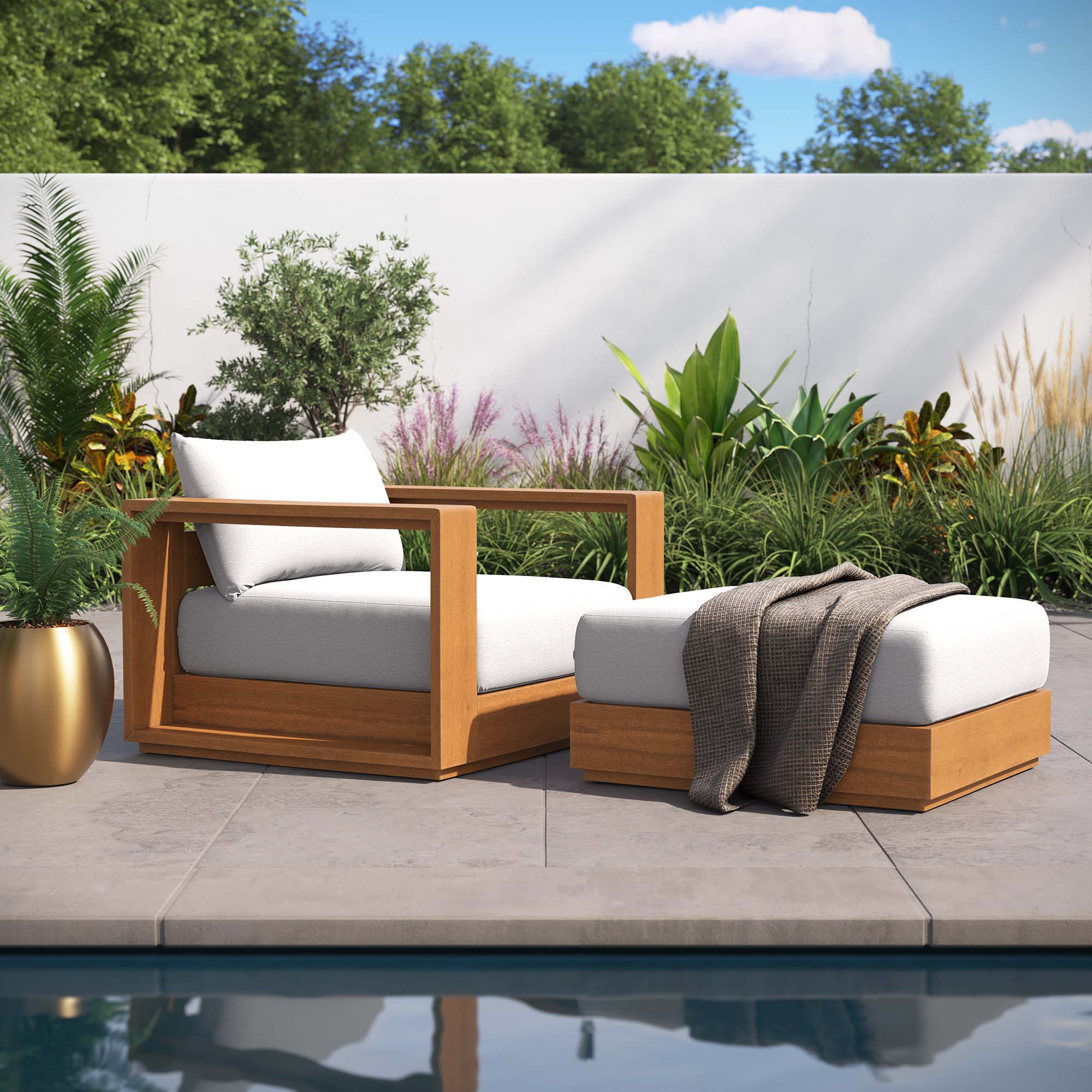 Outdoor patio armchair and ottoman set with light gray cushions and acacia wood base