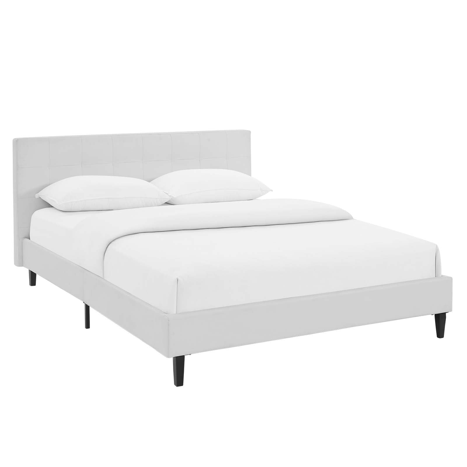 White upholstered platform bed frame with tufted headboard and faux leather finish