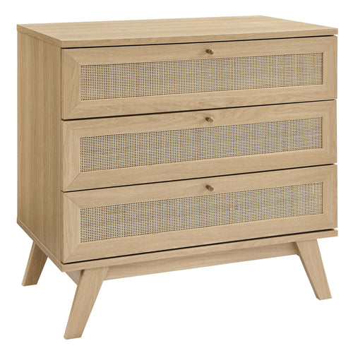 3-drawer wood dresser in natural oak finish with rattan-front drawer panels